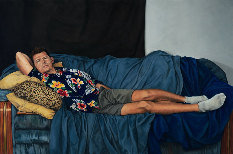 Dude on a Panther Skin depicts a man with a blue tropical shirt reclining on gold and leopard print pillows. He is resting on a blue sofa covered in blue fabric. 